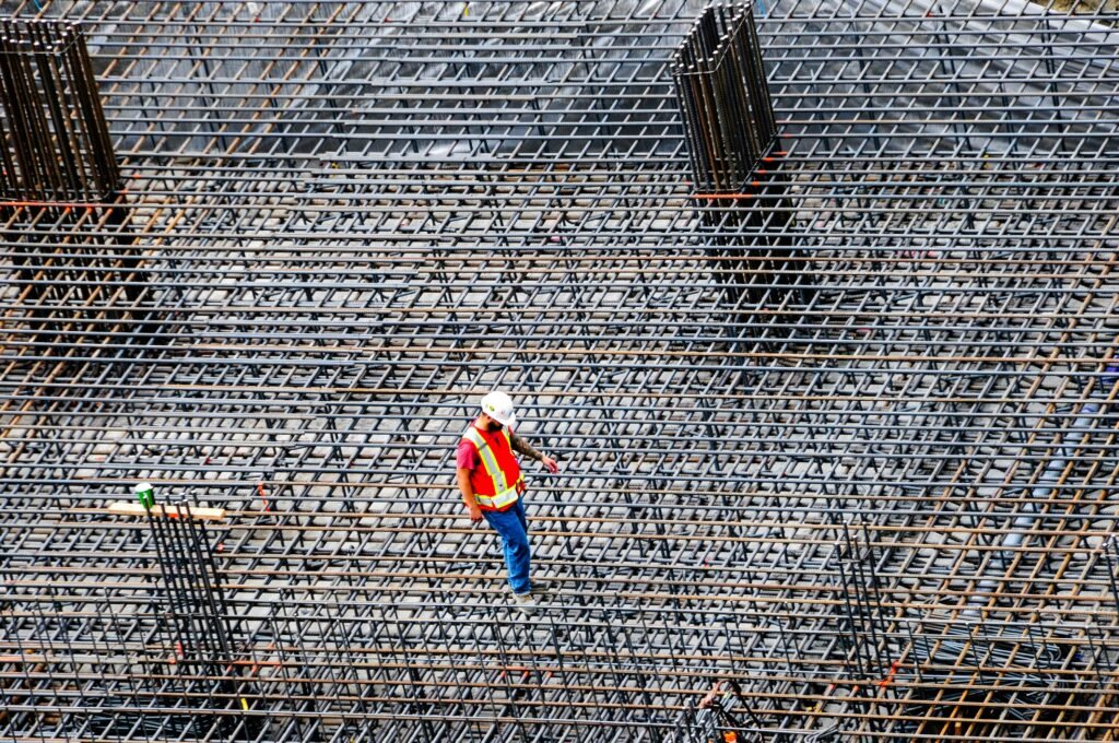hire a structural engineering firm — engineer reviewing blueprints
