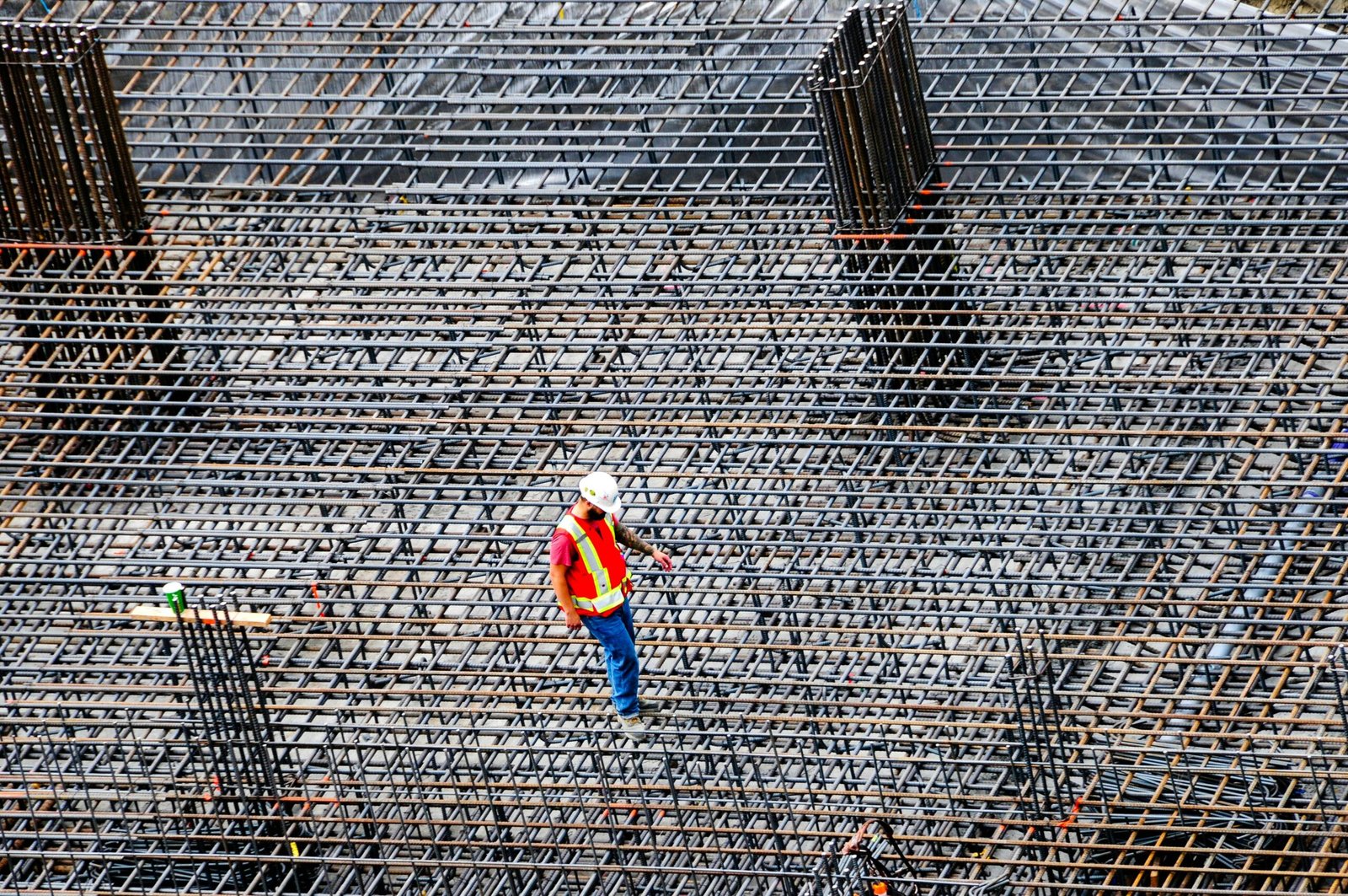 hire a structural engineering firm — engineer reviewing blueprints